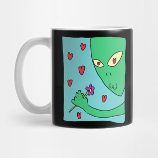 Alien picking flowers Mug